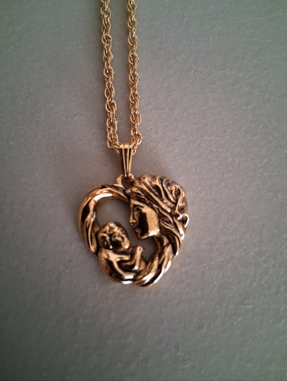 Vintage Avon Gold-tone  Madonna and Child Pendant Necklace.